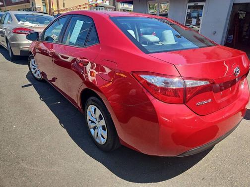 Red 2015 Toyota Corolla LE