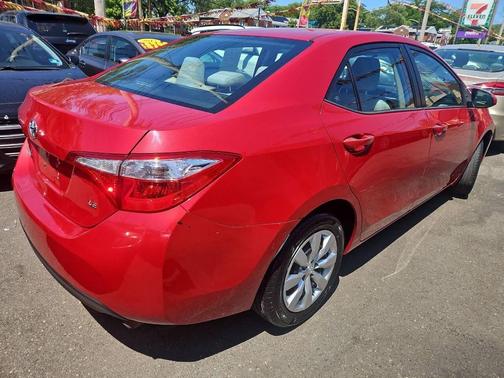 Red 2015 Toyota Corolla LE