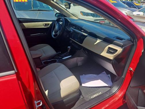 Red 2015 Toyota Corolla LE