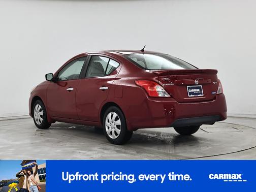 Red 2015 Nissan Versa SV