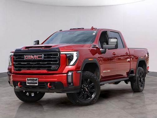 Volcanic Red Tintcoat 2024 GMC Sierra 3500 AT4