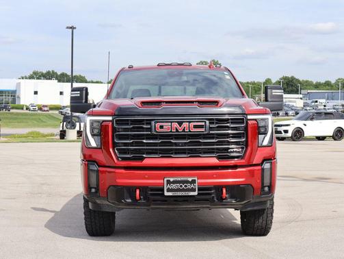 Volcanic Red Tintcoat 2024 GMC Sierra 3500 AT4