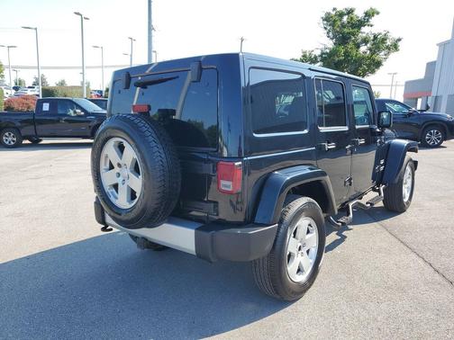 Black Clearcoat 2012 Jeep Wrangler Unlimited Sahara