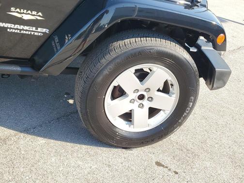 Black Clearcoat 2012 Jeep Wrangler Unlimited Sahara