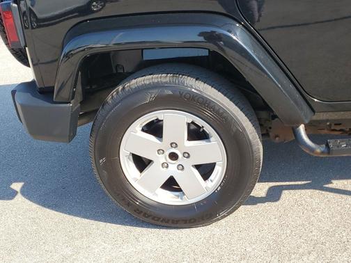 Black Clearcoat 2012 Jeep Wrangler Unlimited Sahara