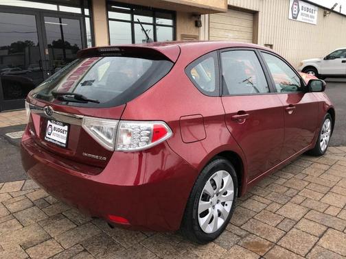 Red 2010 Subaru Impreza 2.5 i