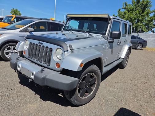 Bright Silver Metallic 2012 Jeep Wrangler Unlimited Altitude