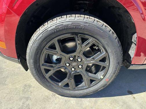 Ruby Red Metallic Tinted Clearcoat 2026 Ford Maverick Lariat