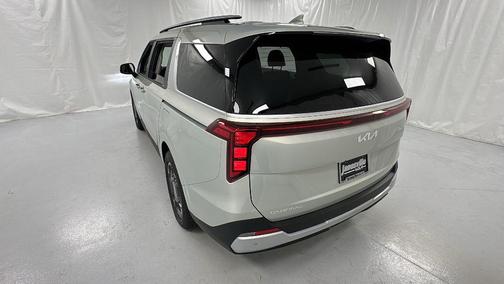 Ivory Silver 2026 Kia Carnival Hybrid EX
