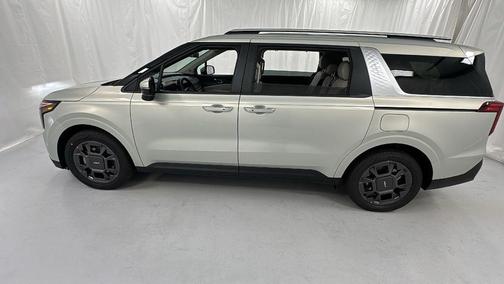 Ivory Silver 2026 Kia Carnival Hybrid EX