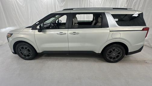 Ivory Silver 2026 Kia Carnival Hybrid EX