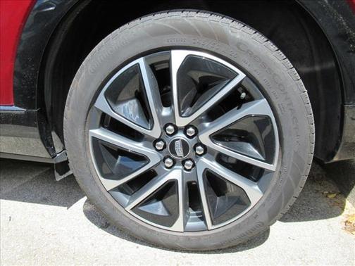 Radiant Red 2025 Cadillac OPTIQ Sport