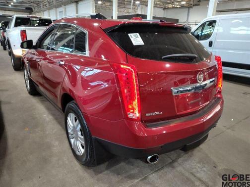 Crystal Red Tintcoat 2016 Cadillac SRX Luxury Collection