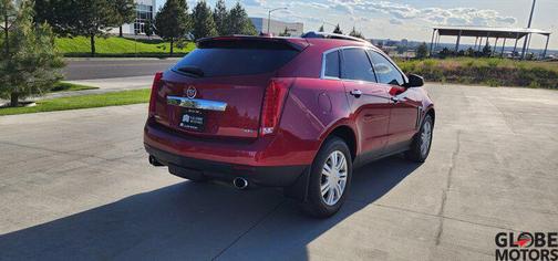Crystal Red Tintcoat 2016 Cadillac SRX Luxury Collection
