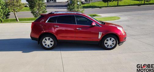 Crystal Red Tintcoat 2016 Cadillac SRX Luxury Collection