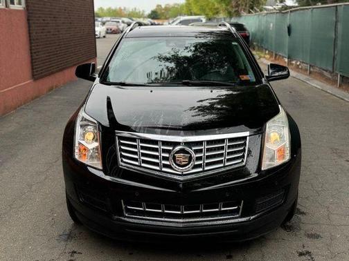 Black Raven 2016 Cadillac SRX Luxury Collection