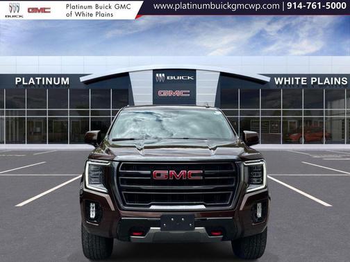 Redwood Metallic 2023 GMC Yukon XL 4WD AT4