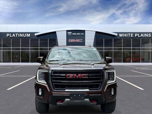 Redwood Metallic 2023 GMC Yukon XL 4WD AT4