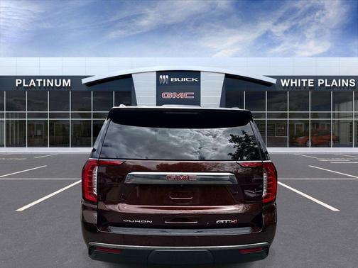 Redwood Metallic 2023 GMC Yukon XL 4WD AT4