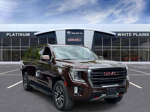 Redwood Metallic 2023 GMC Yukon XL 4WD AT4