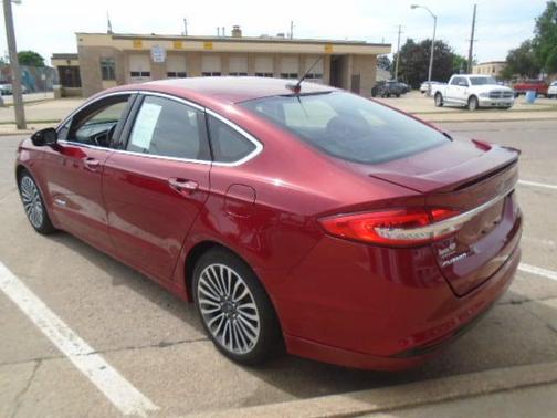 Ruby Red Metallic Tinted Clearcoat 2017 Ford Fusion Hybrid Titanium