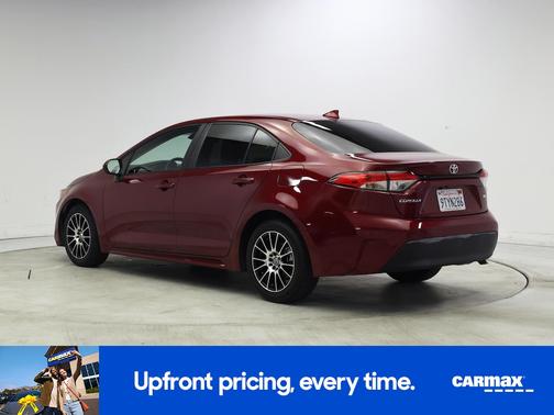 Red 2023 Toyota Corolla LE