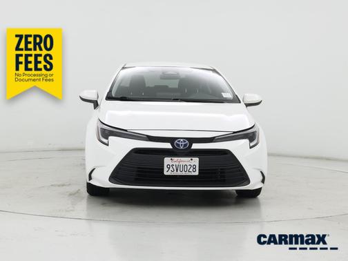 White 2025 Toyota Corolla Hybrid LE