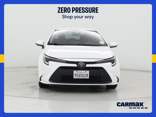 White 2025 Toyota Corolla Hybrid LE