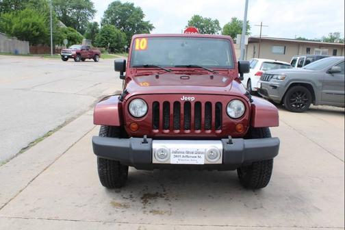 Maroon 2010 Jeep Wrangler Sahara