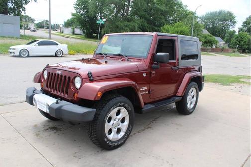 Maroon 2010 Jeep Wrangler Sahara