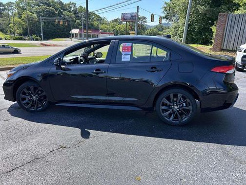 Midnight Black Metallic 2026 Toyota Corolla Hybrid SE