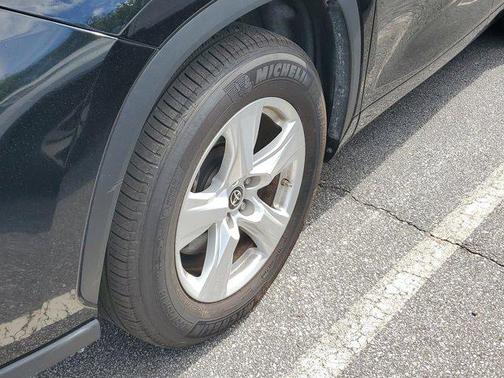 Midnight Black Metallic 2025 Toyota Highlander LE