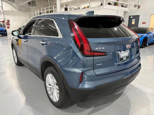 Deep Sea Metallic 2024 Cadillac XT4 Luxury