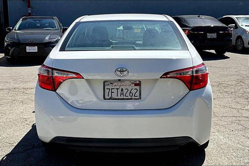 Super White 2014 Toyota Corolla LE Plus