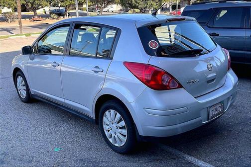 Brilliant Silver Metallic 2012 Nissan Versa 1.8 S