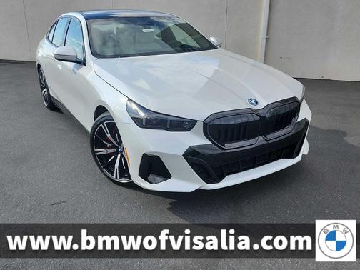 Mineral White Metallic 2026 BMW 550e xDrive