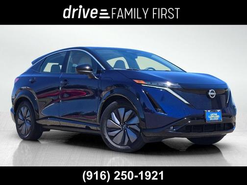 Deep Ocean Blue Pearl/Black Diamond Pearl 2024 Nissan ARIYA EVOLVE+