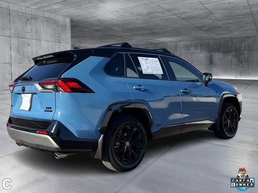 Cavalry Blue/Midnight Black Metallic 2024 Toyota RAV4 Hybrid SE