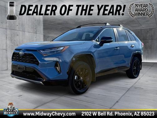 Cavalry Blue/Midnight Black Metallic 2024 Toyota RAV4 Hybrid SE