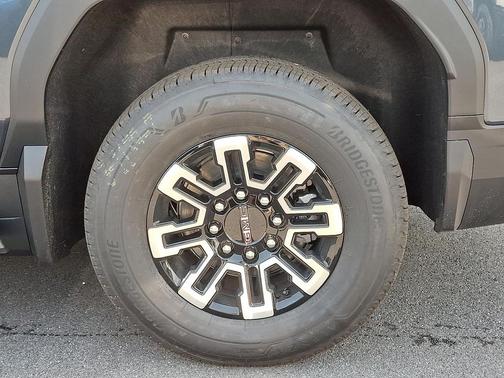 Deep Ocean Metallic 2026 GMC Sierra EV Extended Range Elevation