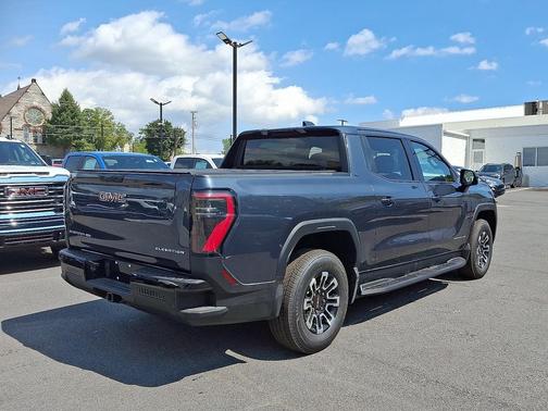 Deep Ocean Metallic 2026 GMC Sierra EV Extended Range Elevation