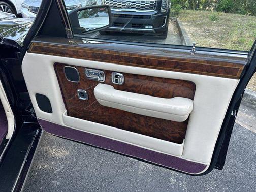 Maroon 1999 Rolls-Royce Silver Spur 4 door