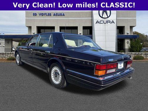 Maroon 1999 Rolls-Royce Silver Spur 4 door