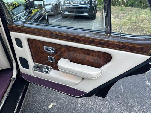 Maroon 1999 Rolls-Royce Silver Spur 4 door