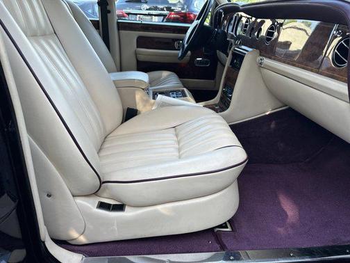 Maroon 1999 Rolls-Royce Silver Spur 4 door