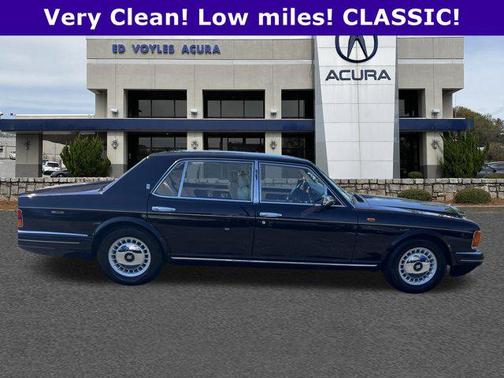 Maroon 1999 Rolls-Royce Silver Spur 4 door