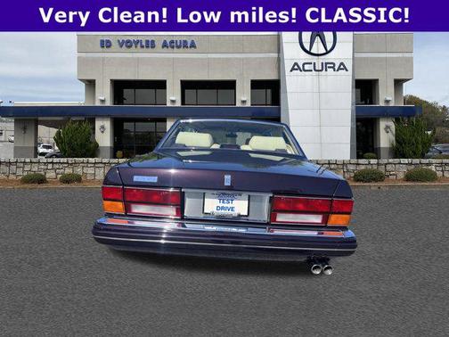 Maroon 1999 Rolls-Royce Silver Spur 4 door
