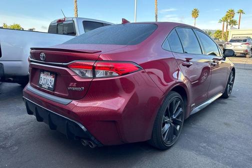 Ruby Flare Pearl 2024 Toyota Corolla Hybrid SE