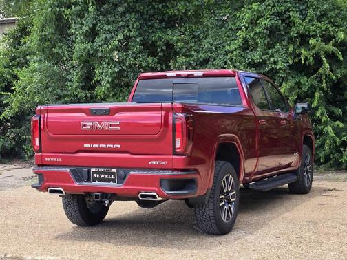 Volcanic Red Tintcoat 2026 GMC Sierra 1500 AT4