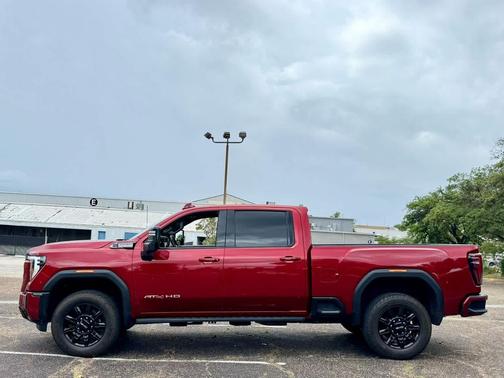 Volcanic Red Tintcoat 2024 GMC Sierra 2500 AT4